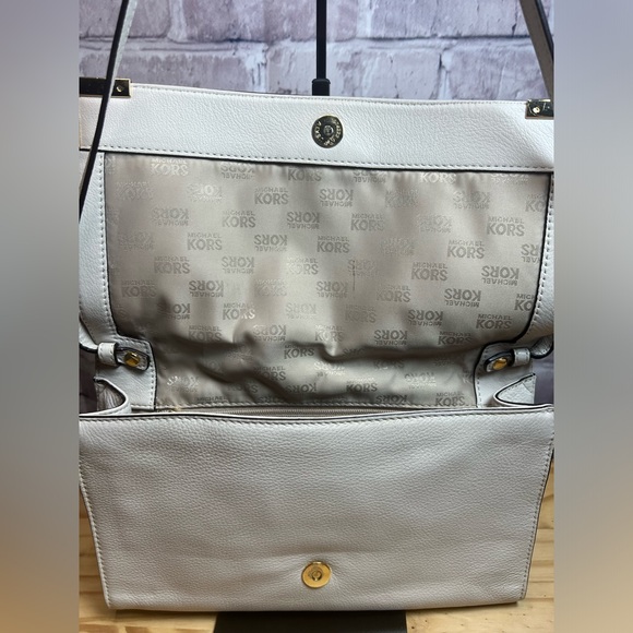 Michael Kors Pebbled Leather Clutch with Removable Strap - Picture 10 of 16